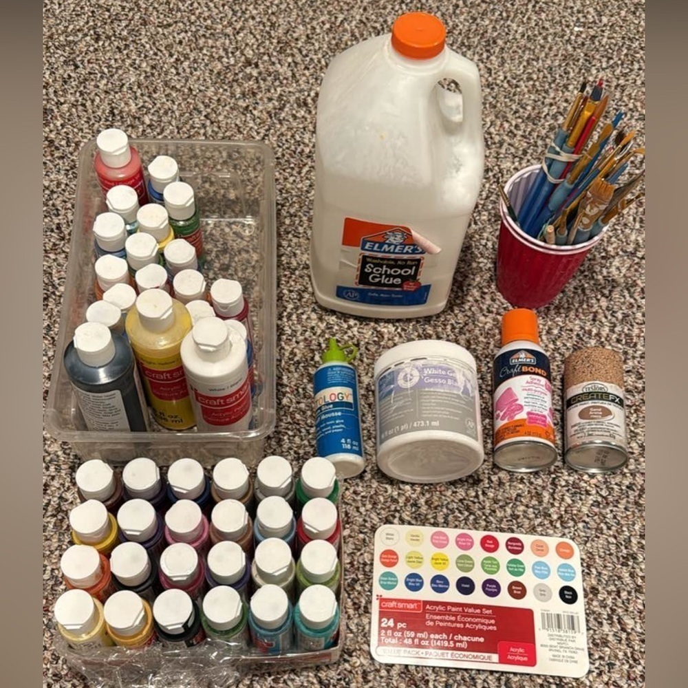 Art Supplies with Elmer's Glue and Paints & brushes